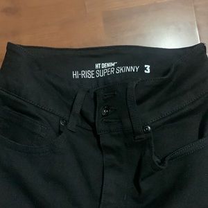 Black jeans with white strips on sides